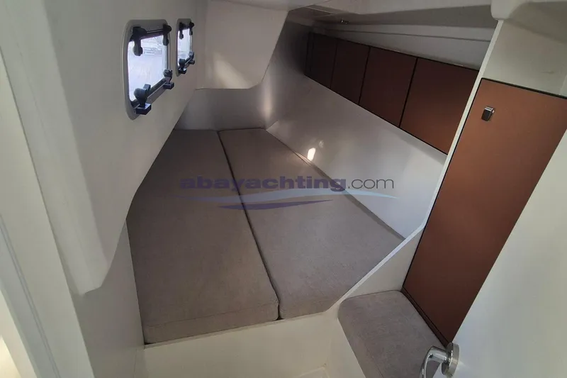  Yacht Photos Pics Interior cabin of 2021 Italia Yachts Italia 11.98 with cozy sleeping area.
