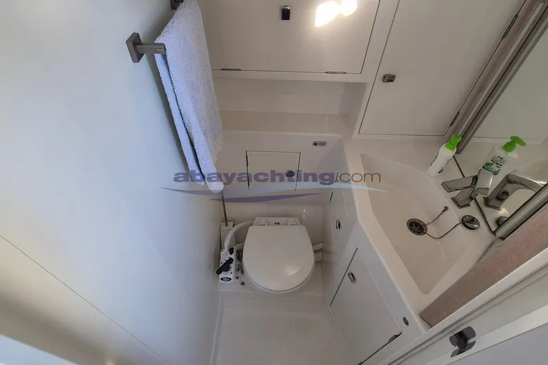  Yacht Photos Pics Italia Yachts 11.98 2021 bathroom with toilet, sink, and towel rack.