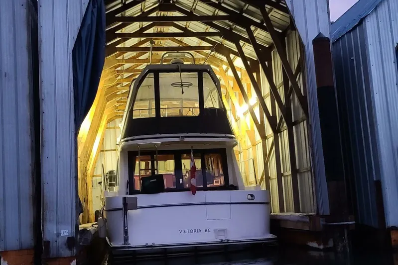  Yacht Photos Pics 1998 Ocean Alexander 420 yacht docked in a well-lit boathouse, Victoria BC.