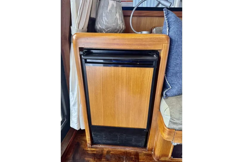  Yacht Photos Pics Wooden interior of 1998 Ocean Alexander 420 yacht with compact fridge.