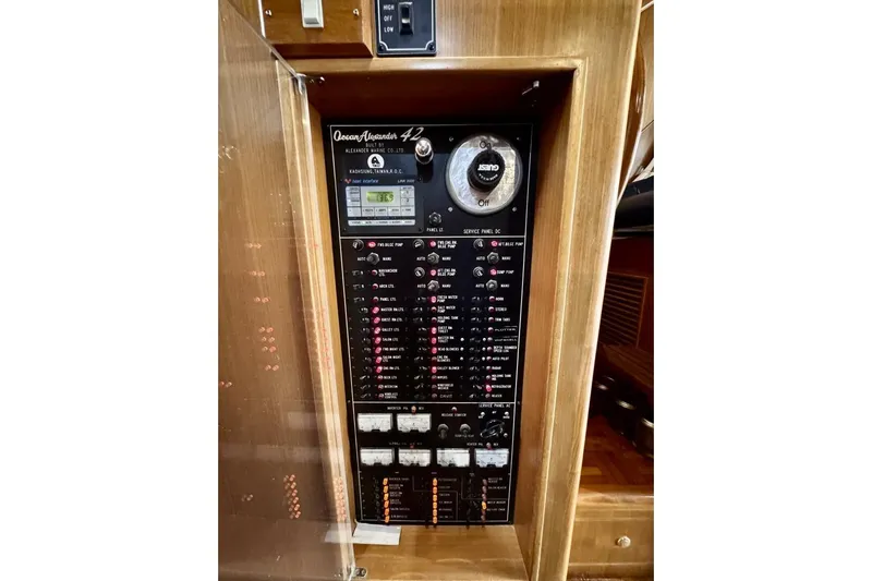  Yacht Photos Pics Control panel of a 1998 Ocean Alexander 420 yacht, featuring various switches and gauges.