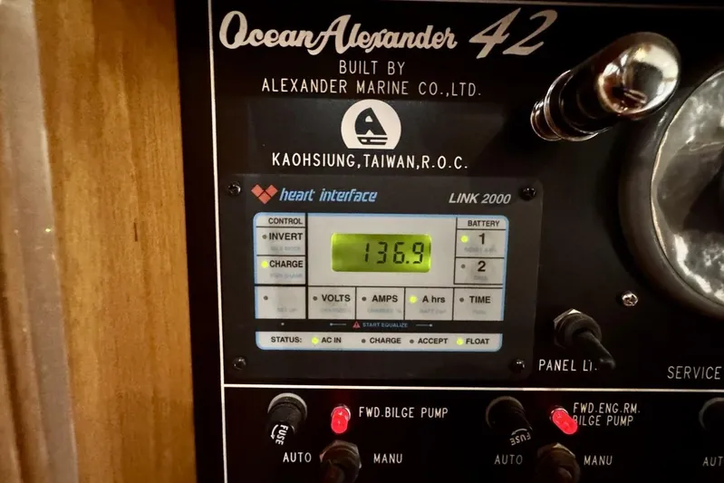  Yacht Photos Pics Control panel of 1998 Ocean Alexander 420 yacht, displaying voltage and settings.