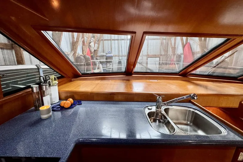  Yacht Photos Pics Interior of 1998 Ocean Alexander 420 yacht with kitchen sink and countertop.