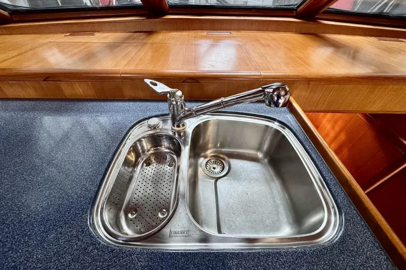  Yacht Photos Pics Stainless steel sink in 1998 Ocean Alexander 420 yacht kitchen.