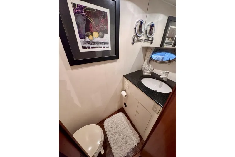  Yacht Photos Pics Bathroom interior of 1998 Ocean Alexander 420 yacht with modern decor and amenities.