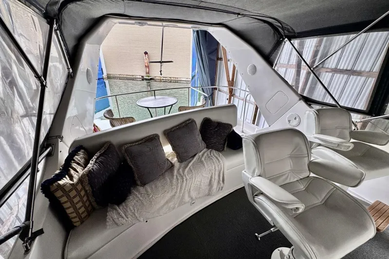  Yacht Photos Pics Luxurious interior of 1998 Ocean Alexander 420 yacht with plush seating and elegant decor.