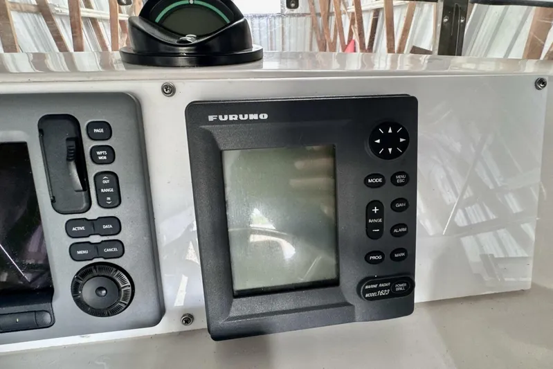  Yacht Photos Pics Furuno marine radar display on 1998 Ocean Alexander 420 yacht dashboard.