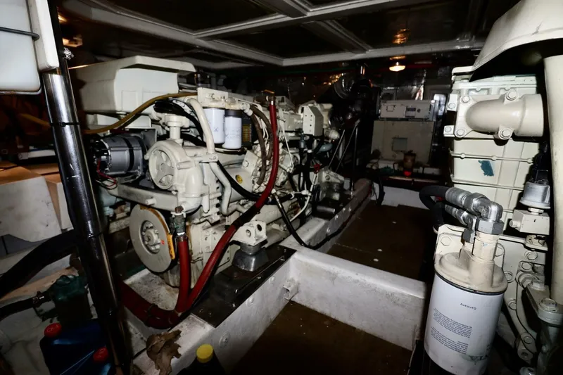  Yacht Photos Pics Engine room of a 1998 Ocean Alexander 420 yacht, showcasing mechanical components.