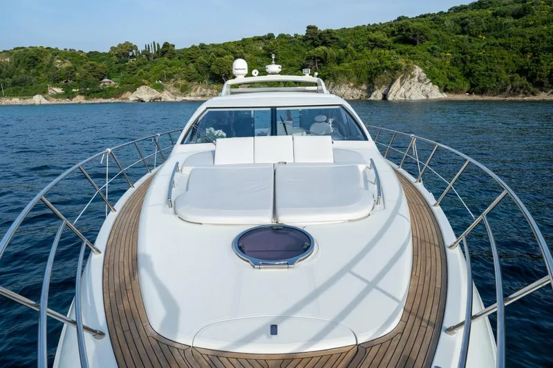 Barba III Yacht Photos Pics Luxurious 2013 Azimut AZ 62S ITALIA yacht cruising near scenic coastline.