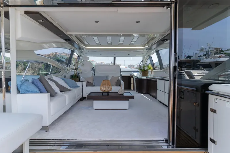 Barba III Yacht Photos Pics Luxurious interior of 2013 Azimut AZ 62S ITALIA yacht with elegant seating and decor.