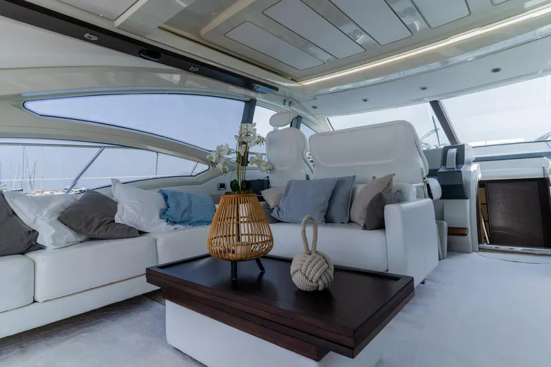 Barba III Yacht Photos Pics Luxurious interior of 2013 Azimut AZ 62S ITALIA yacht with elegant seating and decor.