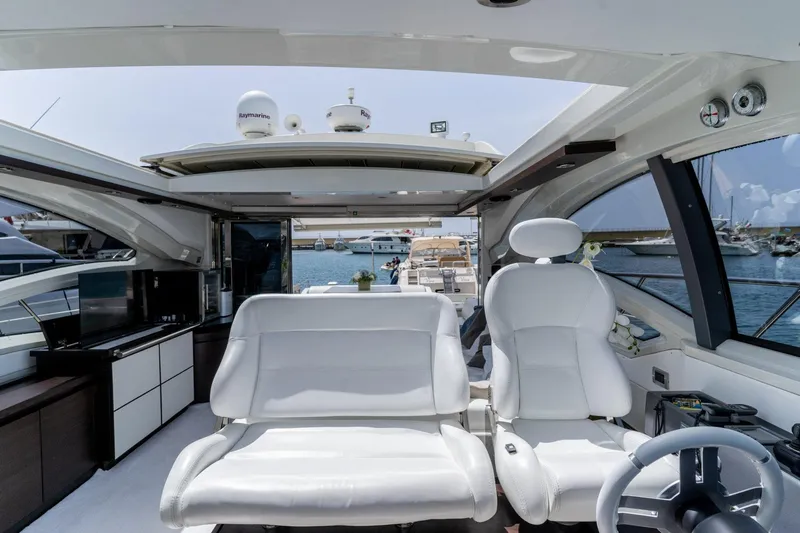Barba III Yacht Photos Pics Luxurious interior of 2013 Azimut AZ 62S ITALIA yacht with white seating and modern design.