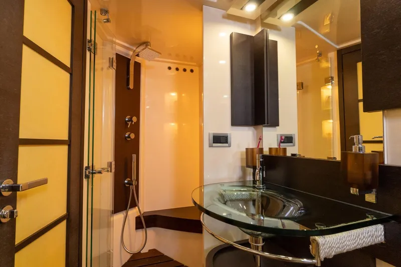 Barba III Yacht Photos Pics Luxurious bathroom in 2013 Azimut AZ 62S ITALIA yacht with modern glass sink and shower.