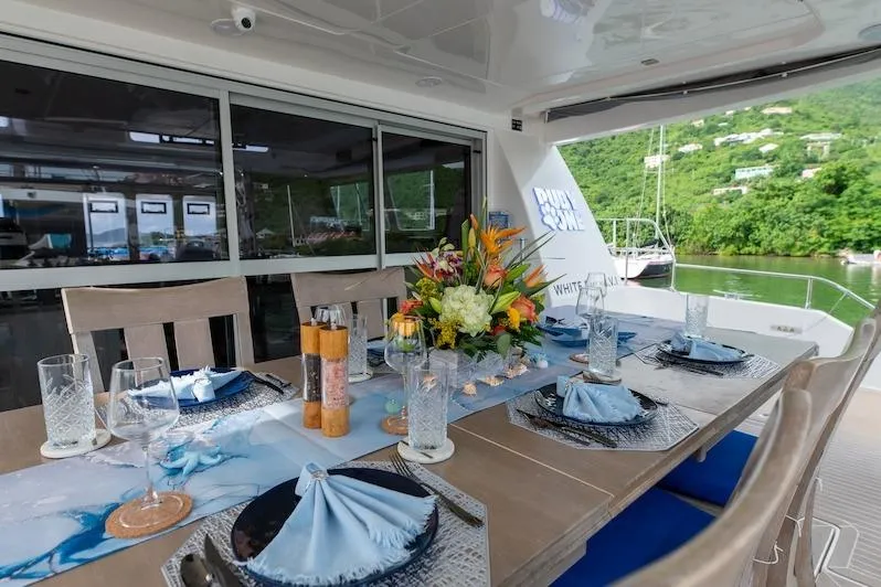 Ruby One Yacht Photos Pics Leopard 58 cockpit dining area