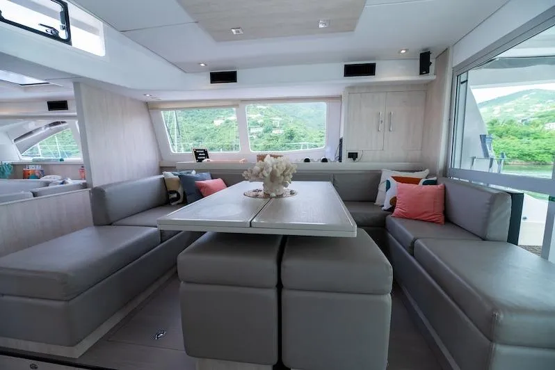 Ruby One Yacht Photos Pics Luxurious interior of 2020 Leopard 58 yacht with modern seating and decor.