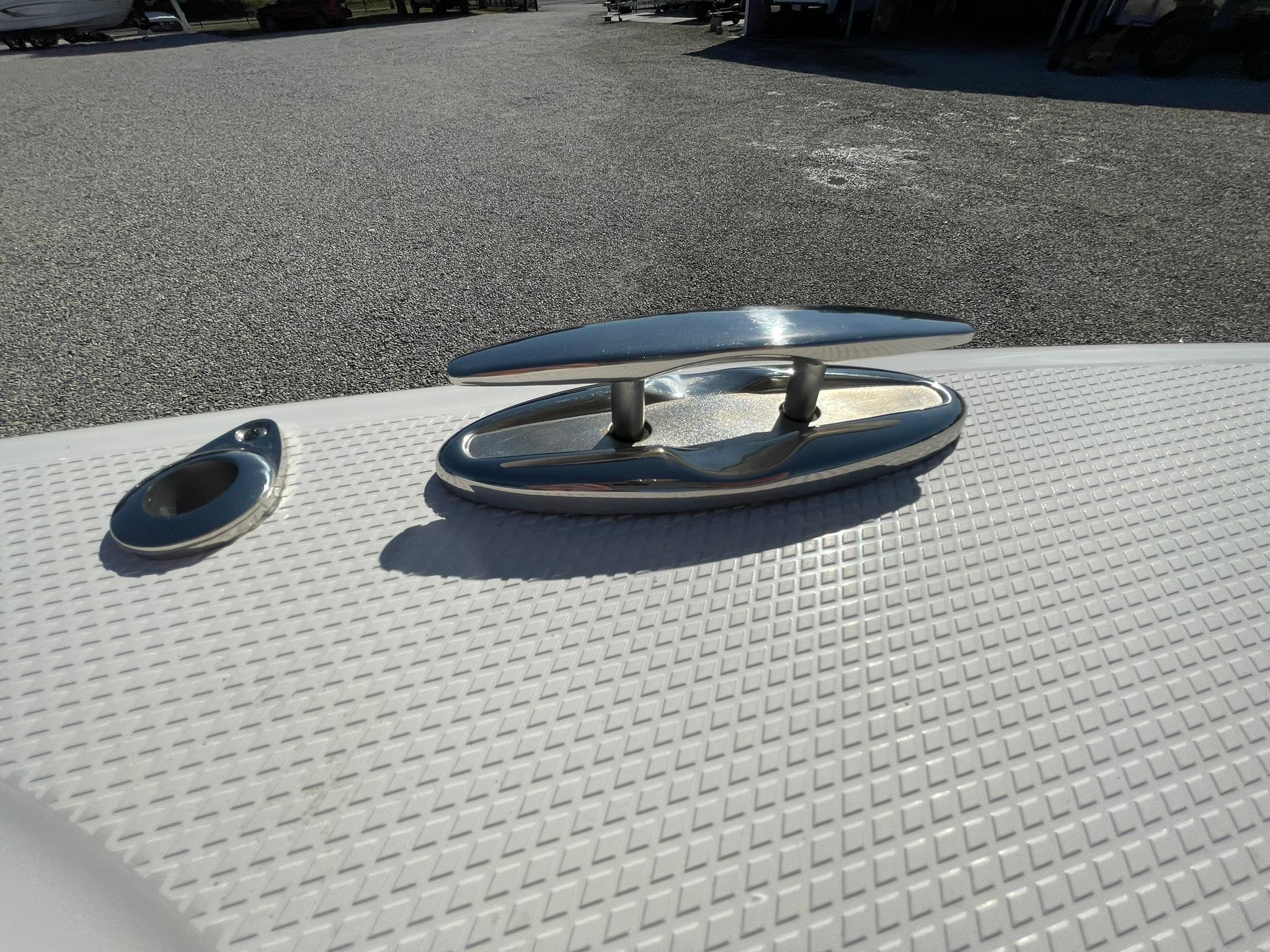 2025 Chaparral 270 OSX boat cleat on textured deck surface.