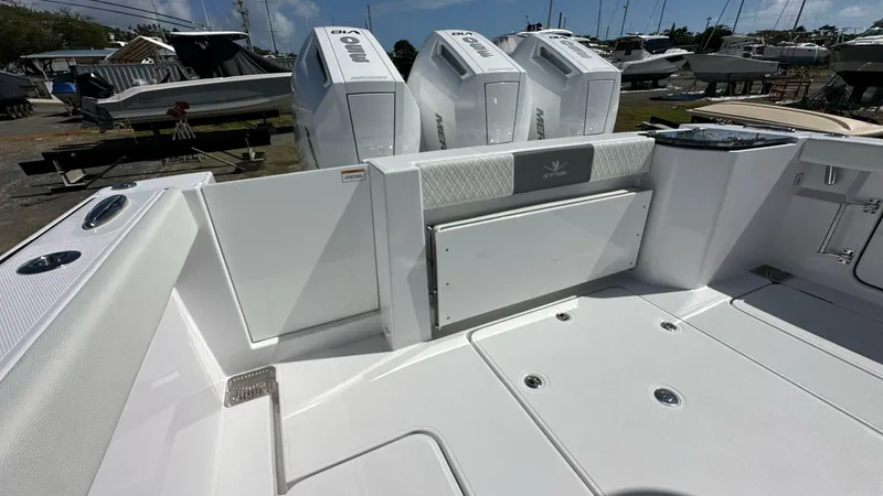  Yacht Photos Pics 2025 Bertram 34 CC boat deck with modern design and powerful outboard engines.