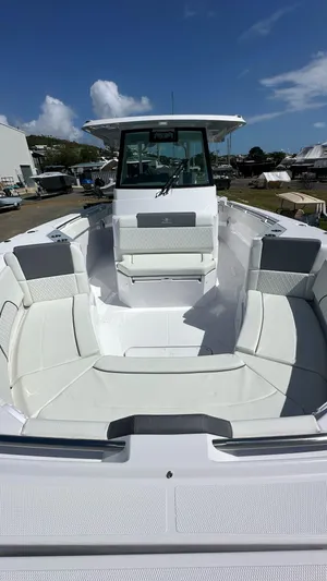  Yacht Photos Pics 2025 Bertram 34 CC boat with spacious seating and modern design.