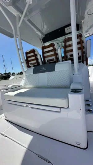  Yacht Photos Pics 2025 Bertram 34 CC boat interior with sleek seating and modern design.