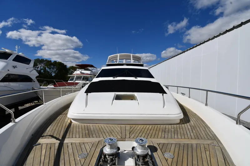 Surfin The Net Yacht Photos Pics 2001 Ferretti Yachts 72 on deck, showcasing sleek design under a clear blue sky.