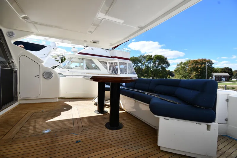 Surfin The Net Yacht Photos Pics Luxurious 2001 Ferretti Yachts 72 with spacious deck and comfortable seating.