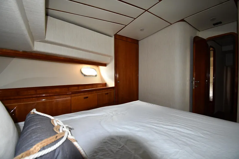 Surfin The Net Yacht Photos Pics Luxurious cabin interior of 2001 Ferretti Yachts 72 with elegant wood finishes.