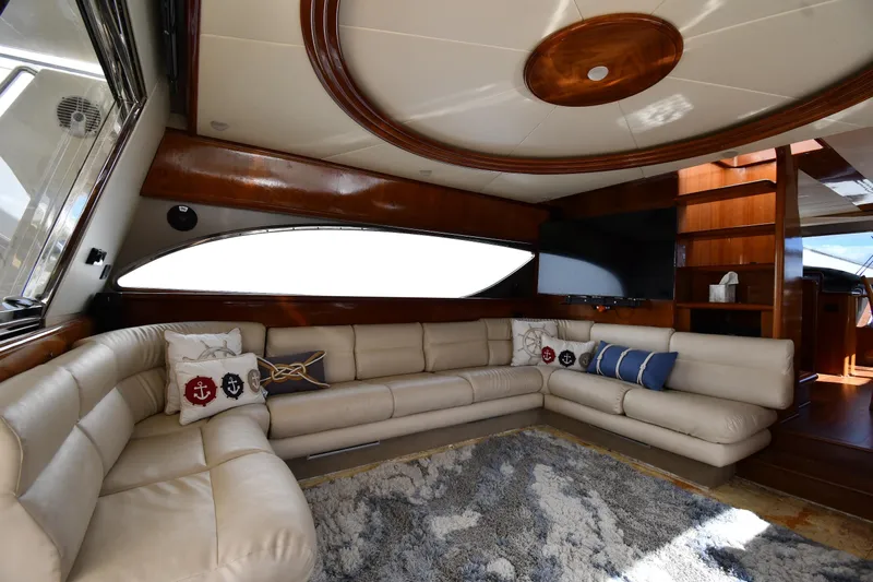 Surfin The Net Yacht Photos Pics Luxurious interior of 2001 Ferretti Yachts 72 with plush seating and nautical decor.
