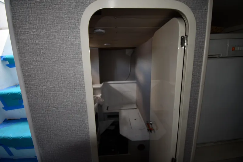 Surfin The Net Yacht Photos Pics Interior view of a 2001 Ferretti Yachts 72, featuring a compact cabin space.