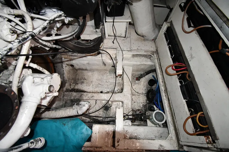 Surfin The Net Yacht Photos Pics Engine room of a 2001 Ferretti Yachts 72, showcasing mechanical components and wiring.