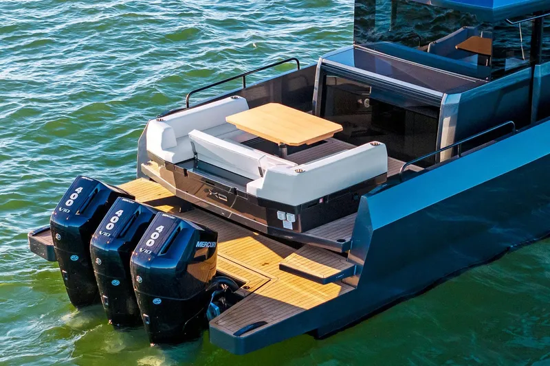  Yacht Photos Pics 2025 XO Boats EXPLR 44 with triple Mercury engines, sleek design, and spacious deck.