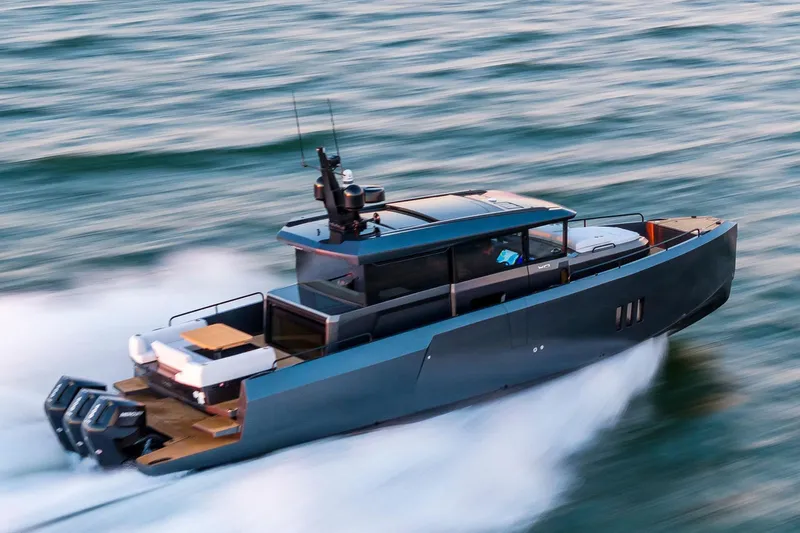  Yacht Photos Pics 2025 XO Boats EXPLR 44 cruising swiftly on open water.