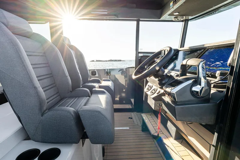  Yacht Photos Pics Interior of 2025 XO Boats EXPLR 44, featuring modern helm and seating with ocean view.
