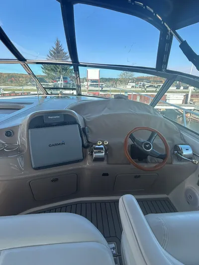  Yacht Photos Pics Helm of 2001 Sea Ray 410 Express Cruiser with Garmin navigation system.