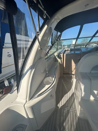  Yacht Photos Pics Interior of a 2001 Sea Ray 410 Express Cruiser with seating and helm area.