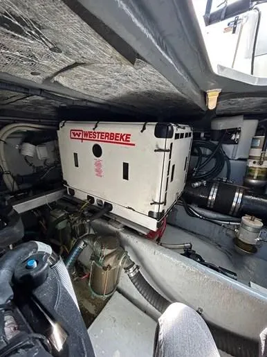  Yacht Photos Pics Engine room of 2001 Sea Ray 410 Express Cruiser with Westerbeke generator.