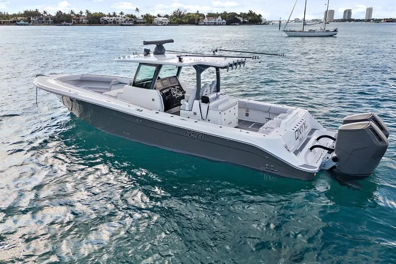 Onyx Yacht Photos Pics 2023 HCB 39 Speciale boat on clear blue water, showcasing sleek design and powerful engines.