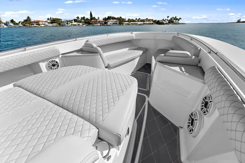 Onyx Yacht Photos Pics 2023 HCB 39 Speciale luxury boat interior with quilted seating and ocean view.
