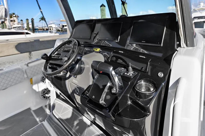 Onyx Yacht Photos Pics Helm of 2023 HCB 39 Speciale boat with modern controls and displays.