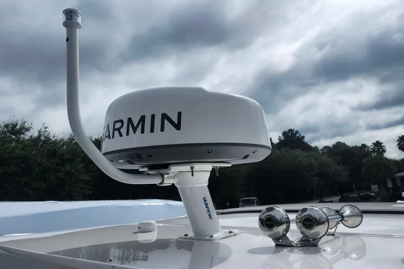  Yacht Photos Pics Garmin radar on 2026 Regal 36 XO boat under cloudy sky.