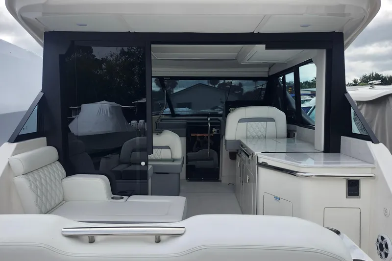  Yacht Photos Pics Luxurious interior of 2026 Regal 36 XO yacht with modern seating and sleek design.