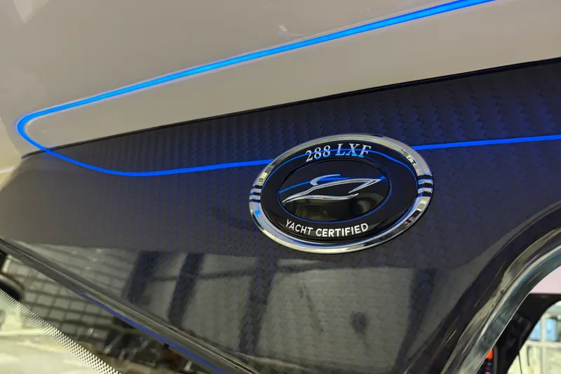  Yacht Photos Pics 2026 Scout 288 LXF yacht certified emblem with sleek carbon fiber design.