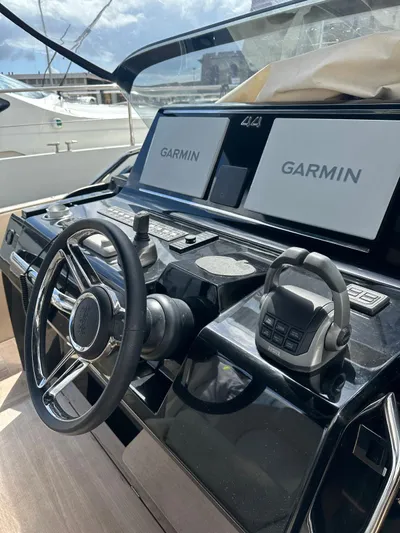  Yacht Photos Pics 2024 Solaris Power 44 Open helm with Garmin navigation displays.