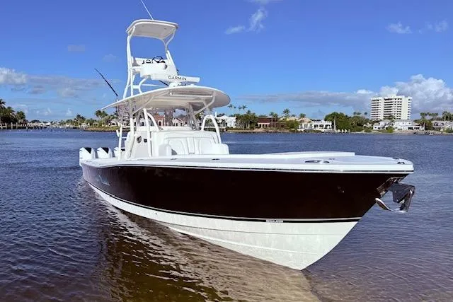  Yacht Photos Pics 2017 Regulator 41 boat on calm water with clear blue sky background.