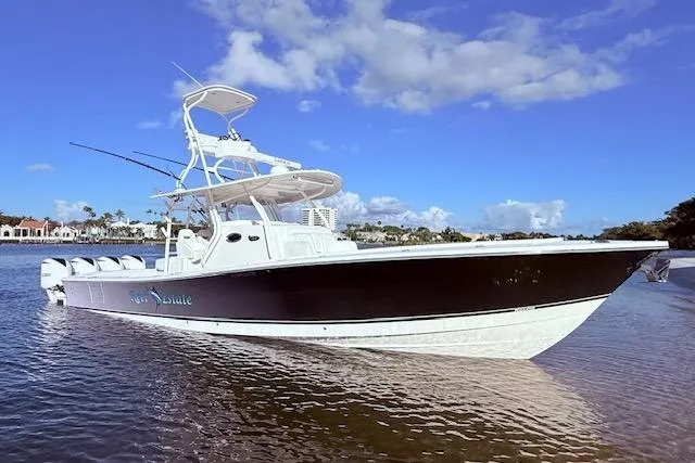  Yacht Photos Pics 2017 Regulator 41 boat on calm water under a clear blue sky.