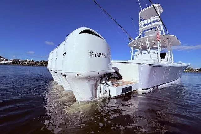  Yacht Photos Pics 2017 Regulator 41 boat with Yamaha outboard engines on calm water.