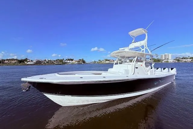  Yacht Photos Pics 2017 Regulator 41 boat on calm water under clear blue sky.