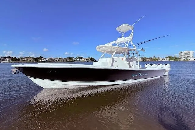  Yacht Photos Pics 2017 Regulator 41 boat on calm water under clear blue sky.