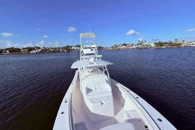  Yacht Photos Pics 2017 Regulator 41 boat on calm water with clear blue sky.