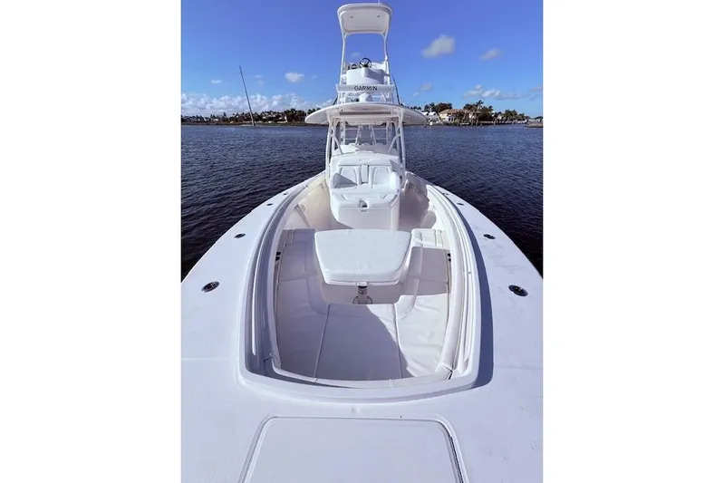  Yacht Photos Pics 2017 Regulator 41 boat on calm water, featuring spacious deck and seating.