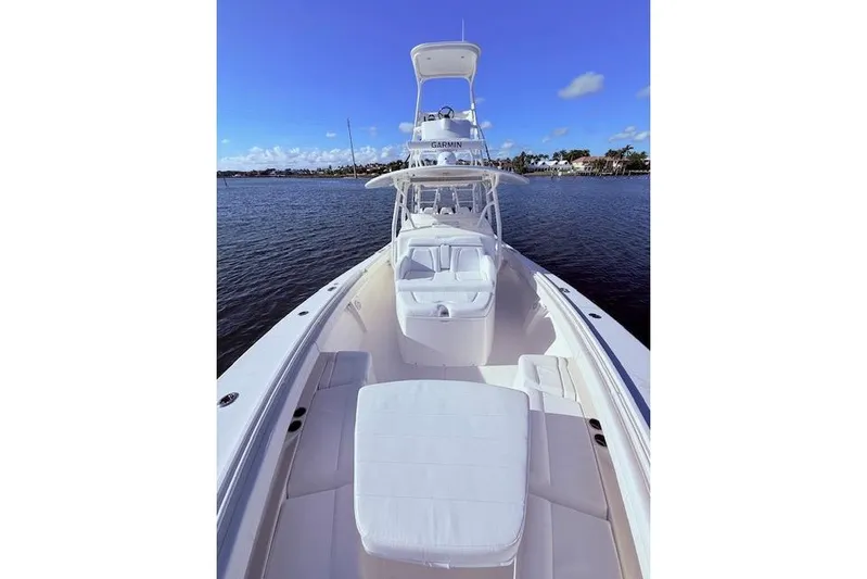  Yacht Photos Pics 2017 Regulator 41 boat on calm water, clear sky, luxurious seating.